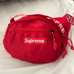 Authentic Supreme waist bag red tag  holder still attach